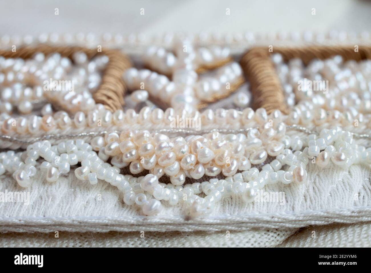 Embroidery of a traditional russian headdress in the technique of pearl sewing. Stock Photo