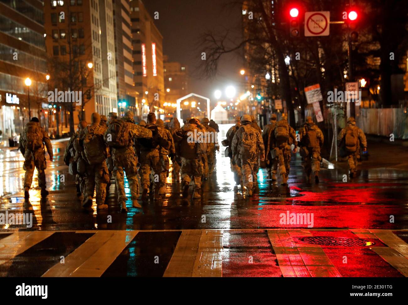 U.S. National Guard soldiers patrol empty streets inside the ?Green Zone? security cordon near the White House ahead of the upcoming presidential inauguration in Washington, U.S. January 15, 2021. REUTERS/Jim Bourg Stock Photo