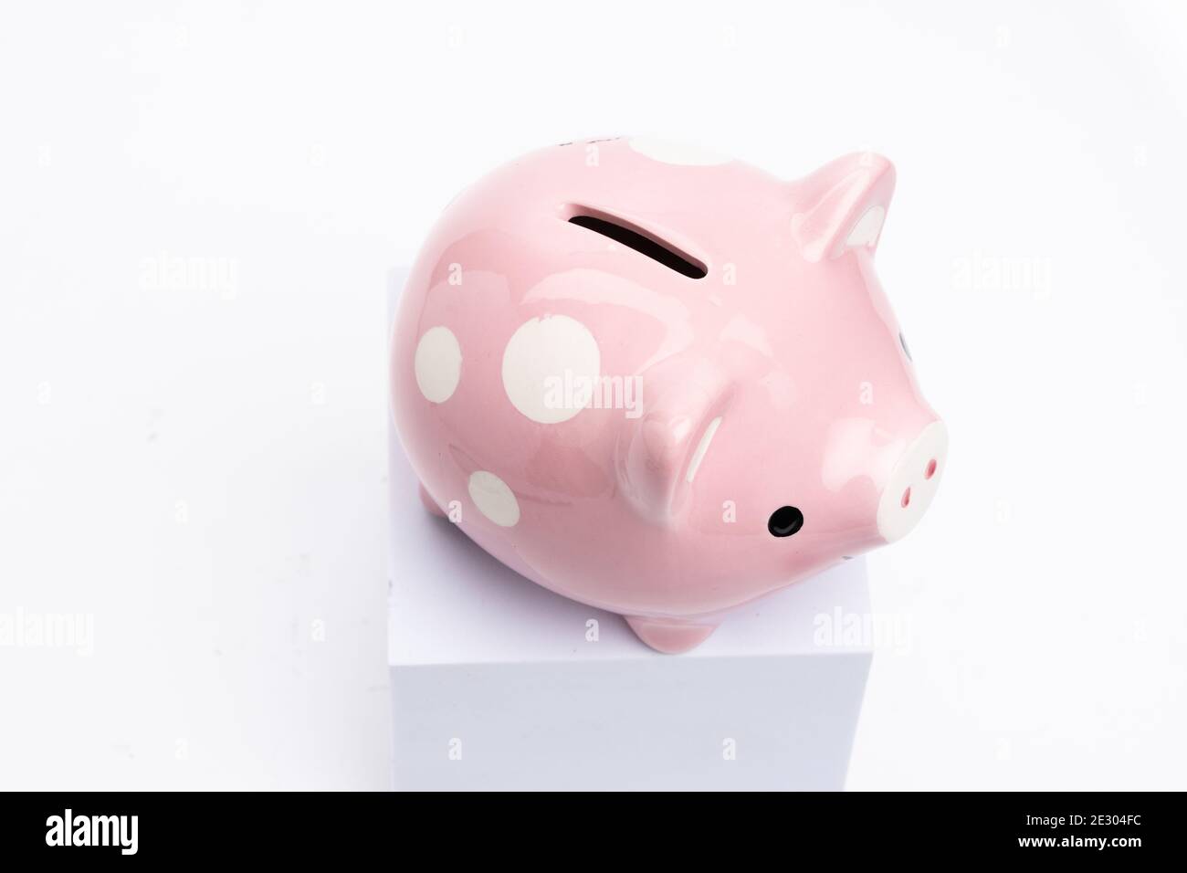 Savings concept. Piggy bank on white background Stock Photo - Alamy