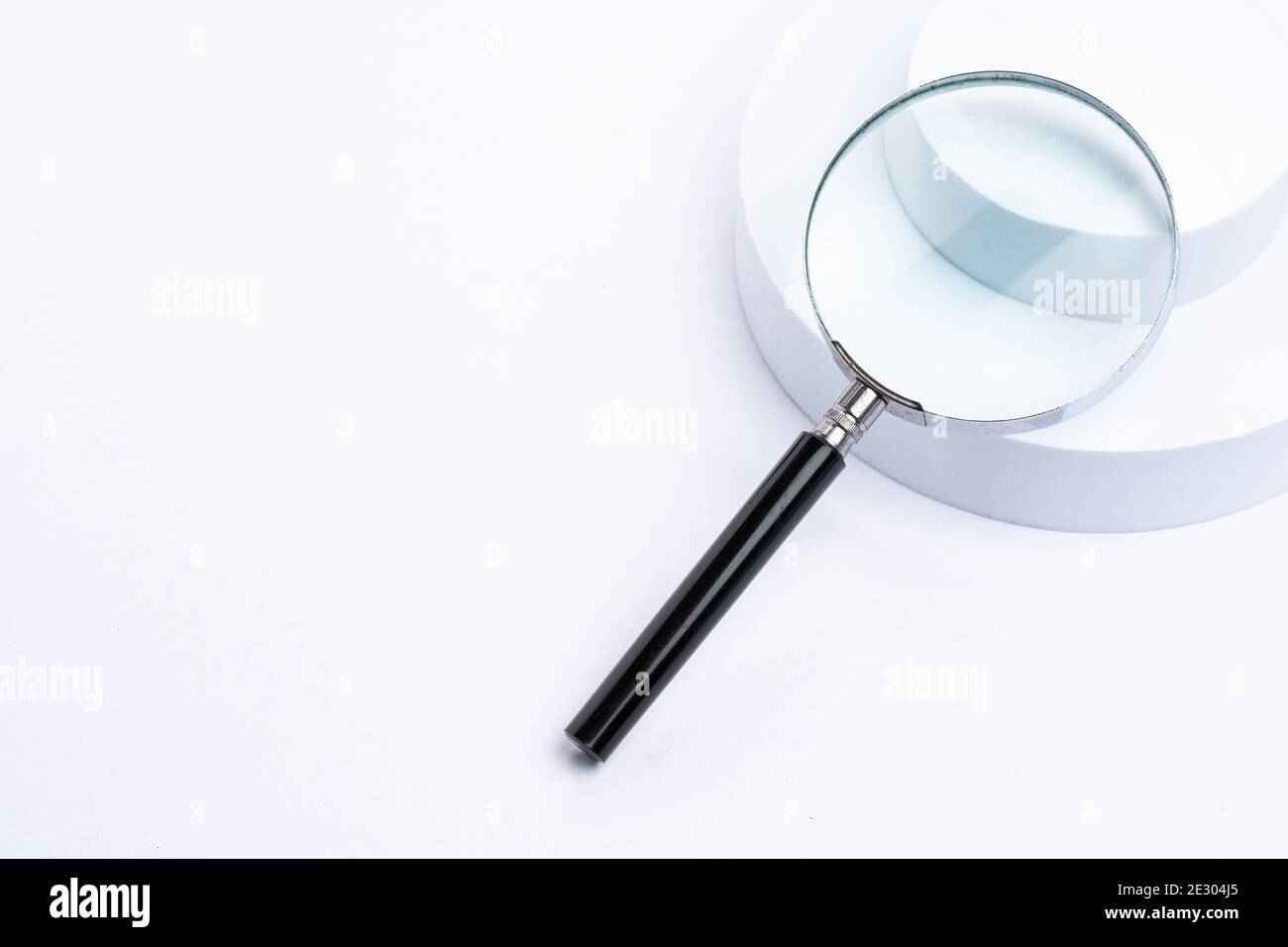 Magnifying glass on white background Stock Photo - Alamy