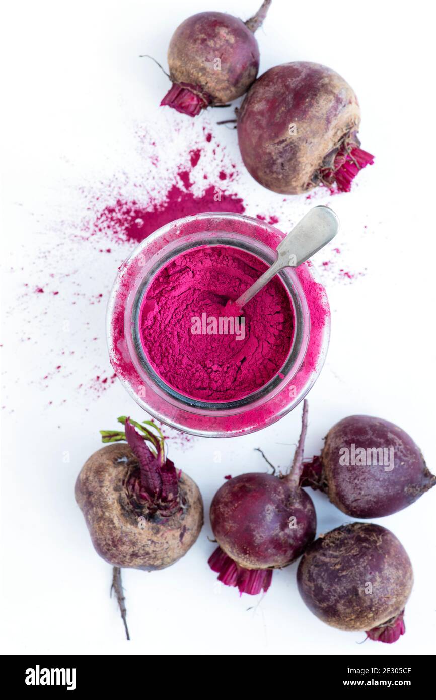 Beta vulgaris. Beetroot powder and beetroots Stock Photo