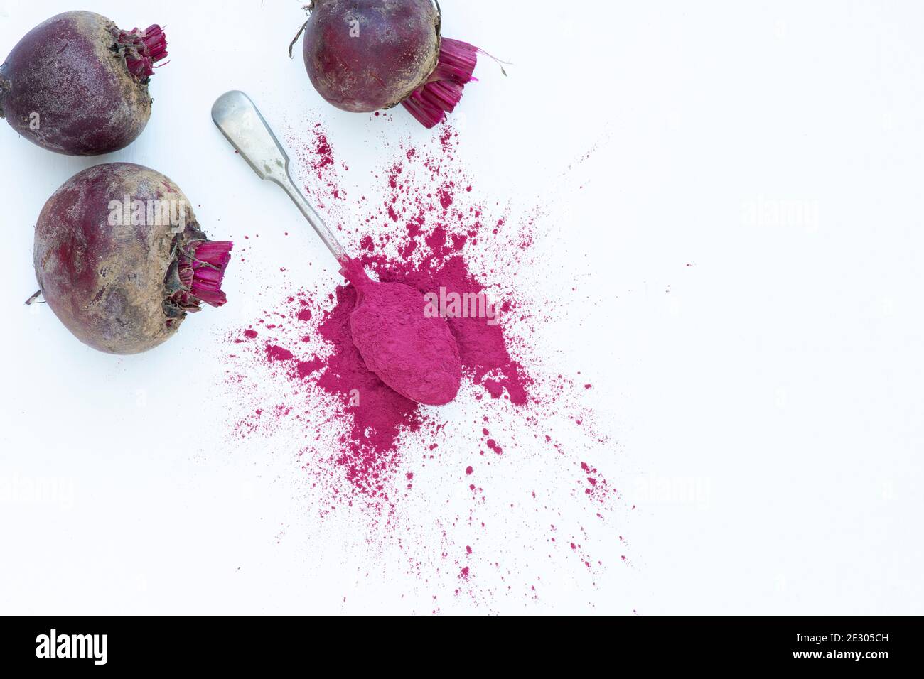 Beta vulgaris. Beetroot powder and beetroots Stock Photo