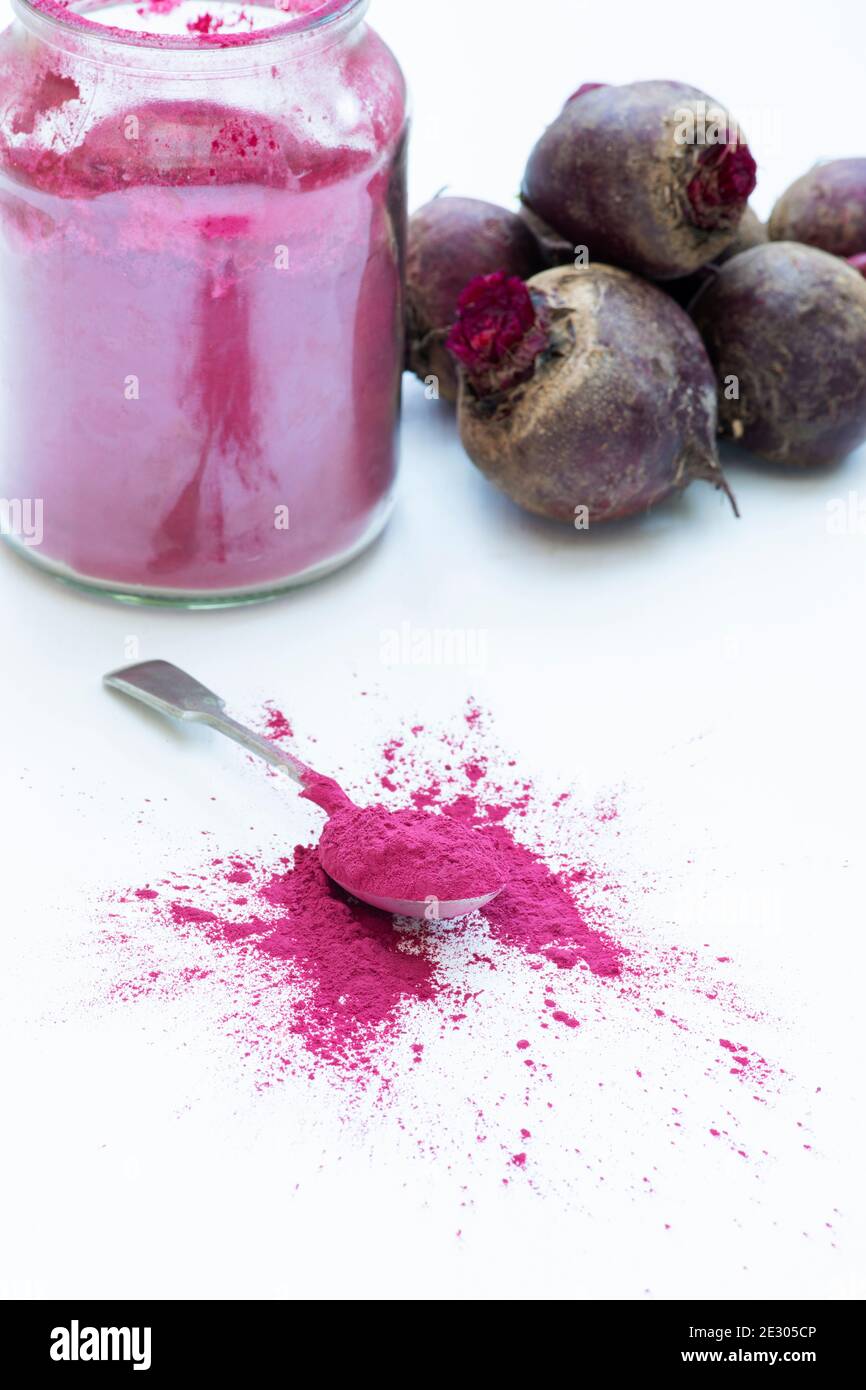 Beta vulgaris. Beetroot powder and beetroots Stock Photo