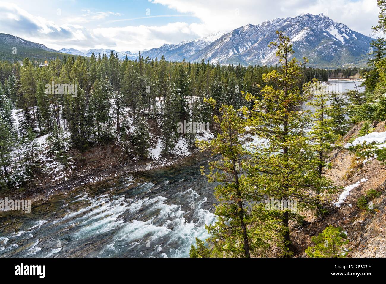 Bow River and Bow Falls in snowy autumn sunny day. View from Surprise ...