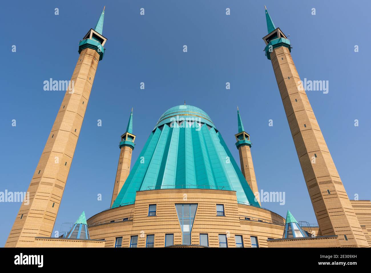 Pavlodar, Kazakhstan - July 27, 2020: the entrance of the Mashkhur Jusup Mosque with four minarets and blue roof. Stock Photo