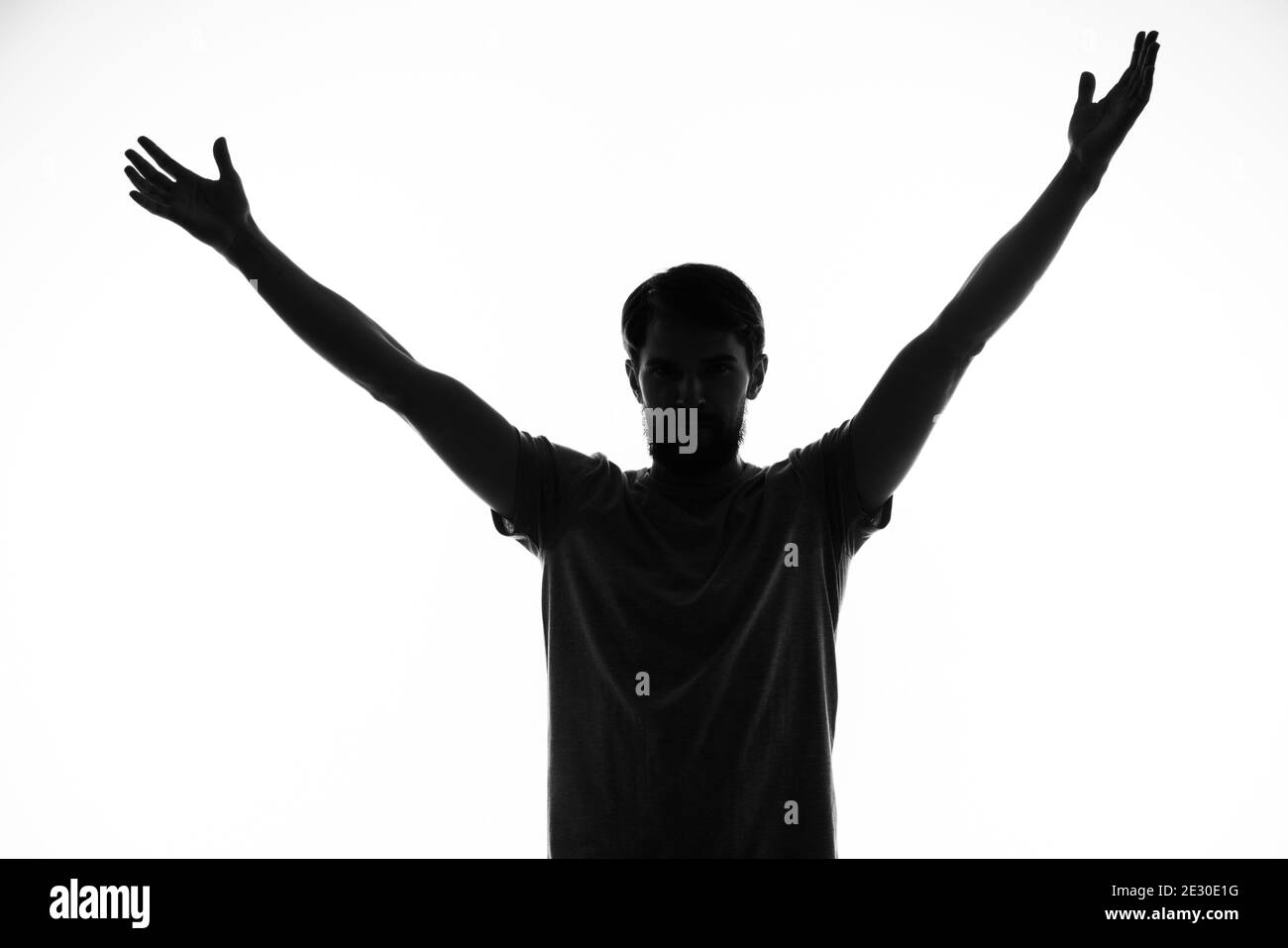 Silhouette man gestures hands hi-res stock photography and images - Alamy
