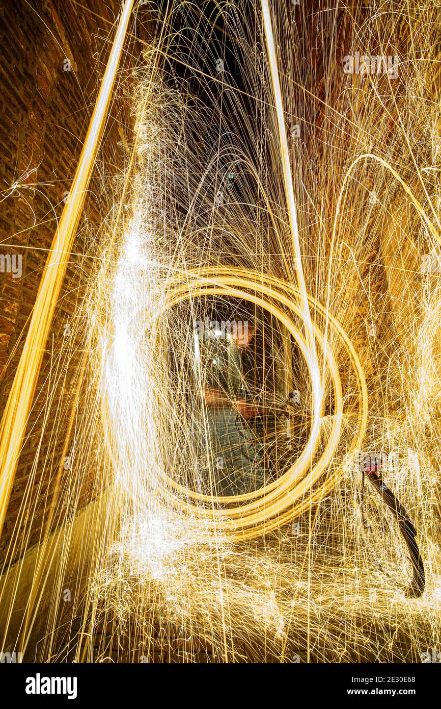 Steel wool photography involves setting light to steel wool and then