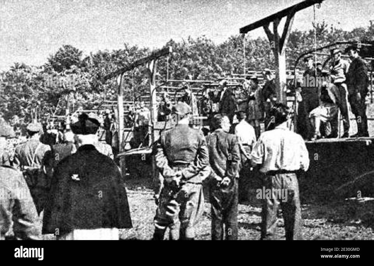 The execution of the SS overseers of the Stutthof concentration camp: Becker, Klaff, Steinhoff, and Pauls on July 4, 1946, with priest Stock Photo