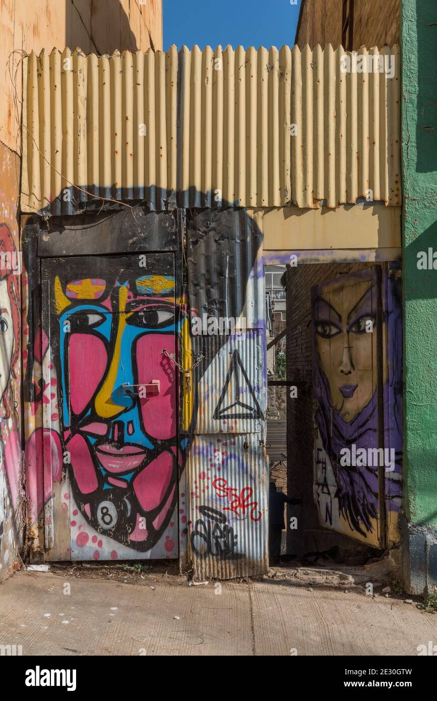 Graffiti street art on the walls and buildings of Valparaiso, Chile Stock Photo