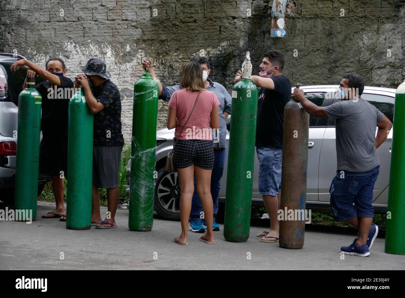 Manaus, Brazil. 15th Jan, 2021. People queue up to buy oxygen at an ...