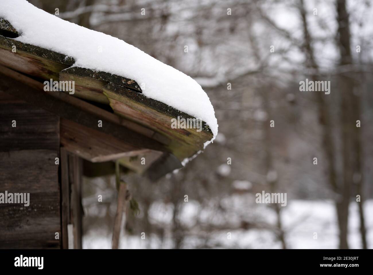 Selective focus shot of snow on a wooden roof Stock Photo - Alamy