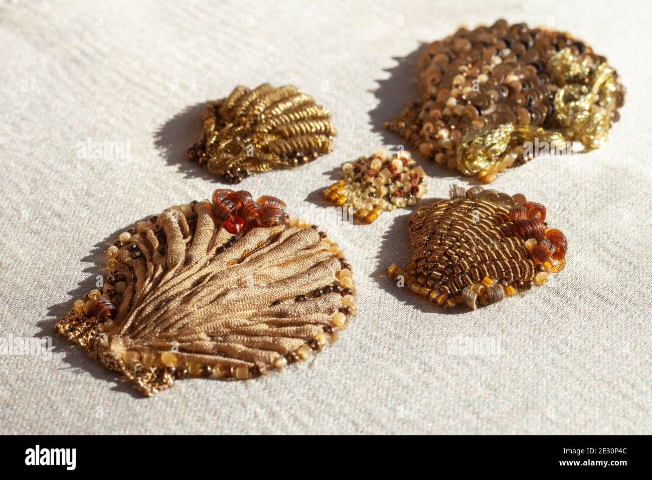 Couture embroidery of sea shells. Stock Photo