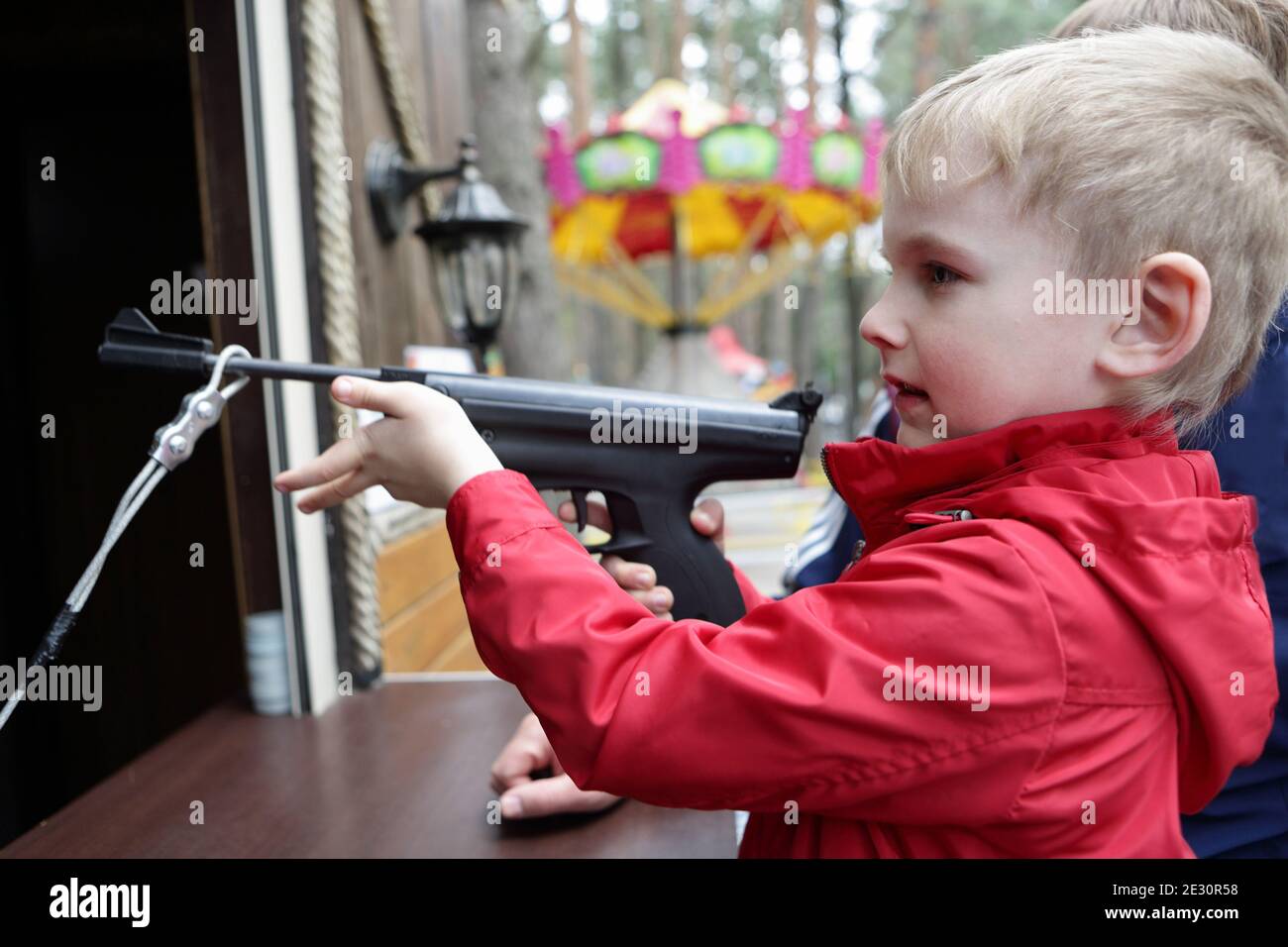 Child shooting air pistol at the rifle range Stock Photo Alamy
