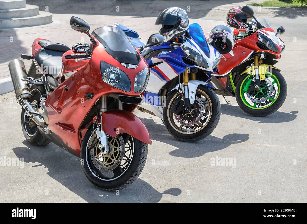 group of motorcycle parking (all logos, inscriptions and markings removed) Stock Photo