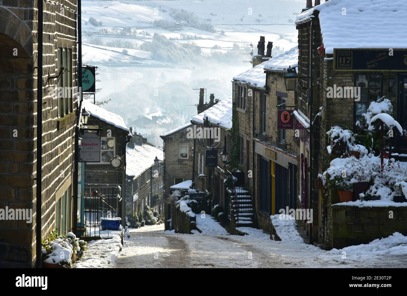 Haworth Main street under snow in Winter, Bronte Country, West ...