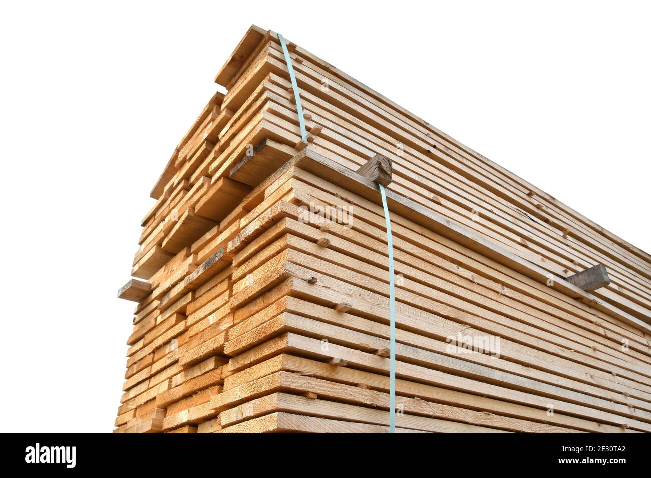 large stacks of wooden planks isolated on white background Stock Photo