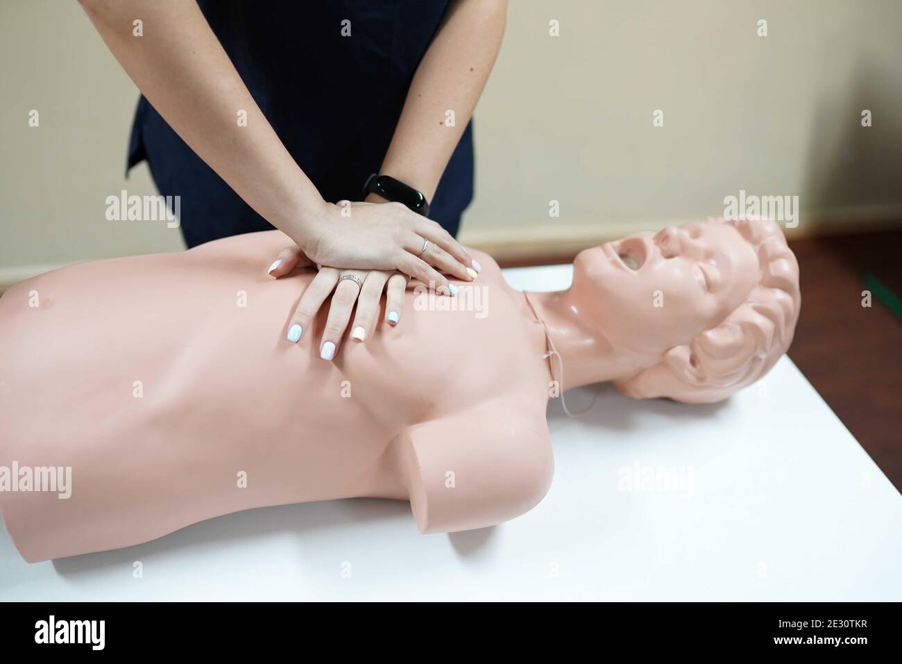 student on a training to do Cardiopulmonary resuscitation Stock Photo
