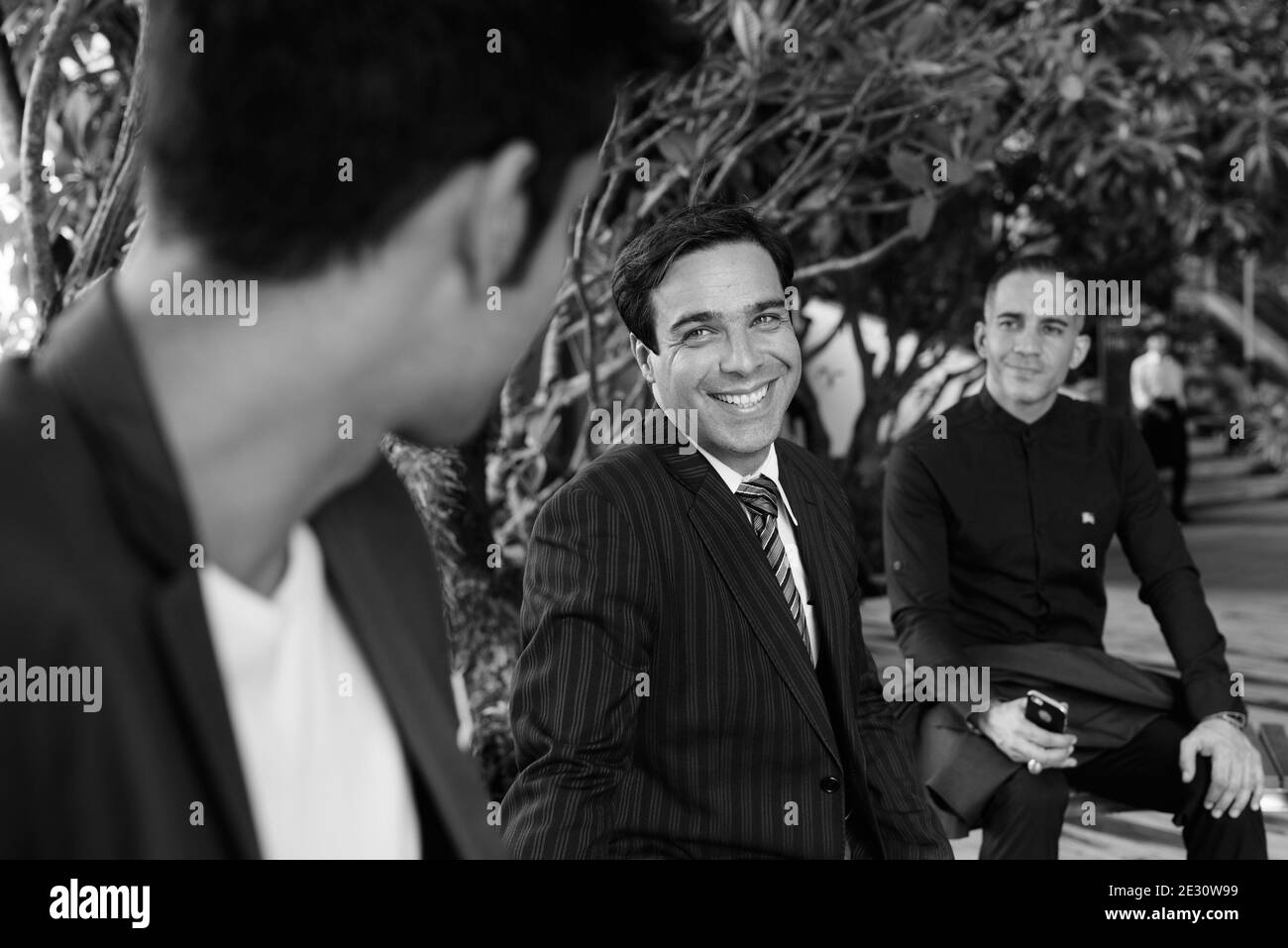 Persian businessmen exploring the city of Bangkok together Stock Photo