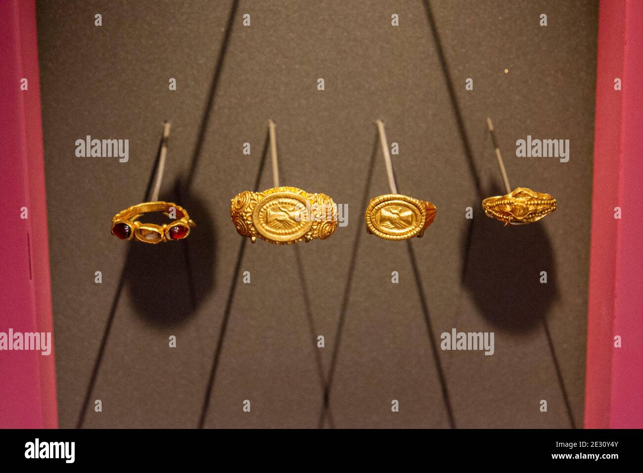 Four gold rings from the Bowerchalke Hoard (Roman, 4th century AD) in The Salisbury Museum, Salisbury, Wiltshire, UK. Stock Photo
