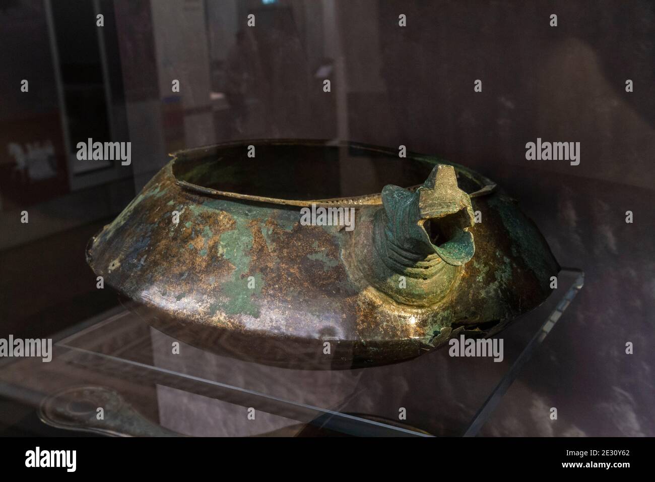 A Roman copper wine strainer bowl, part of a hoard found in Kingston Deverill, Salisbury Museum, Salisbury, Wiltshire, UK. Stock Photo