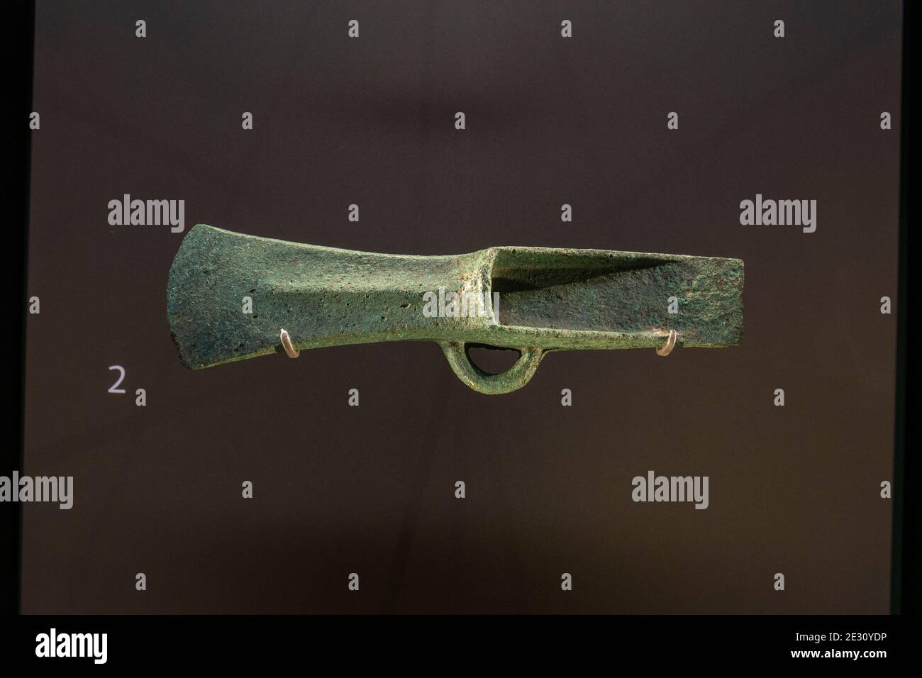 A copper alloy axe (called a palstave) found in a Bronze Age (10300-1000BC) hoard near Monkton Deverill, Salisbury Museum, Salisbury, Wiltshire, UK. Stock Photo
