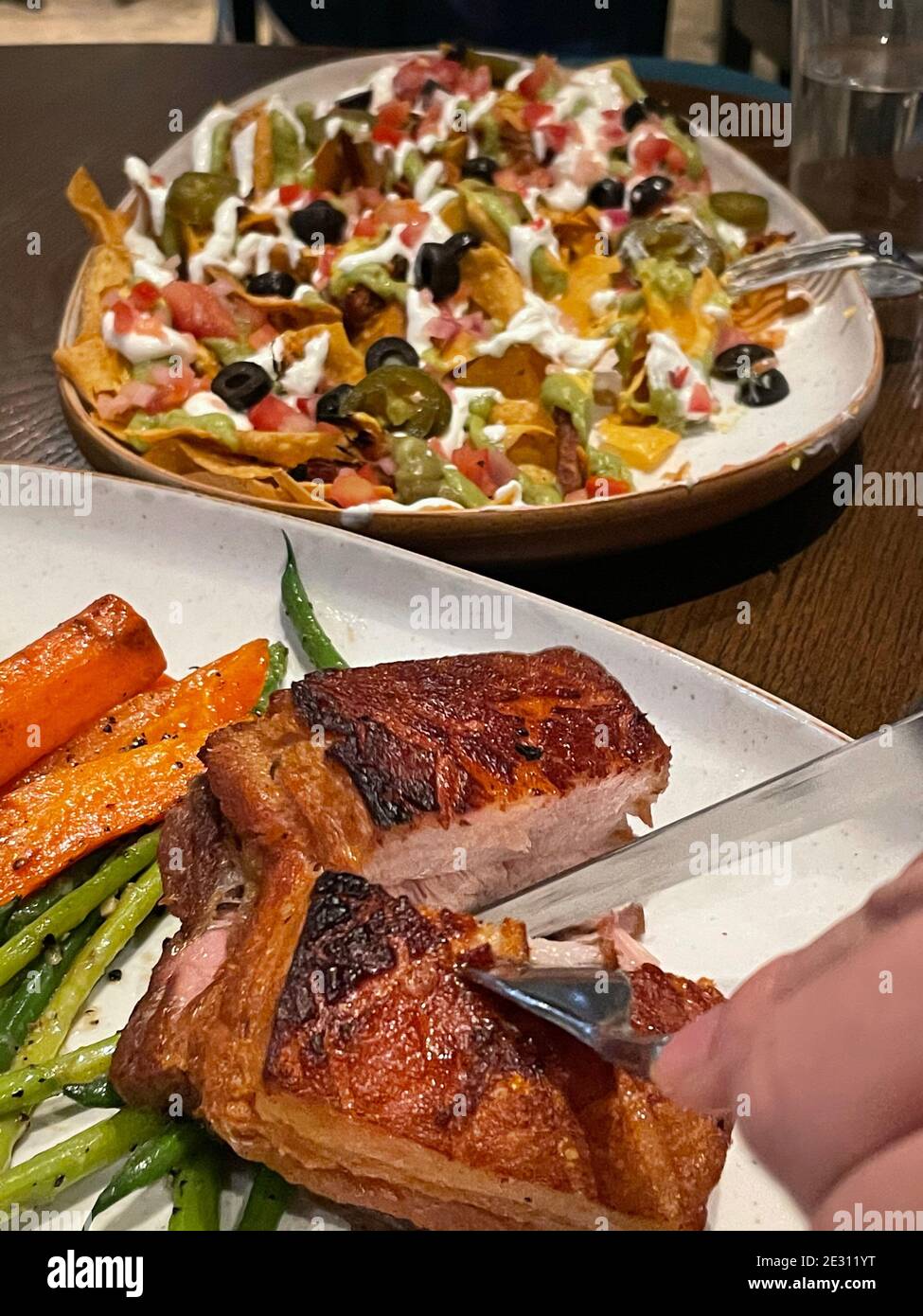 Foodie Slowcooked crackling pork belly and pulled pork cheesy nachos