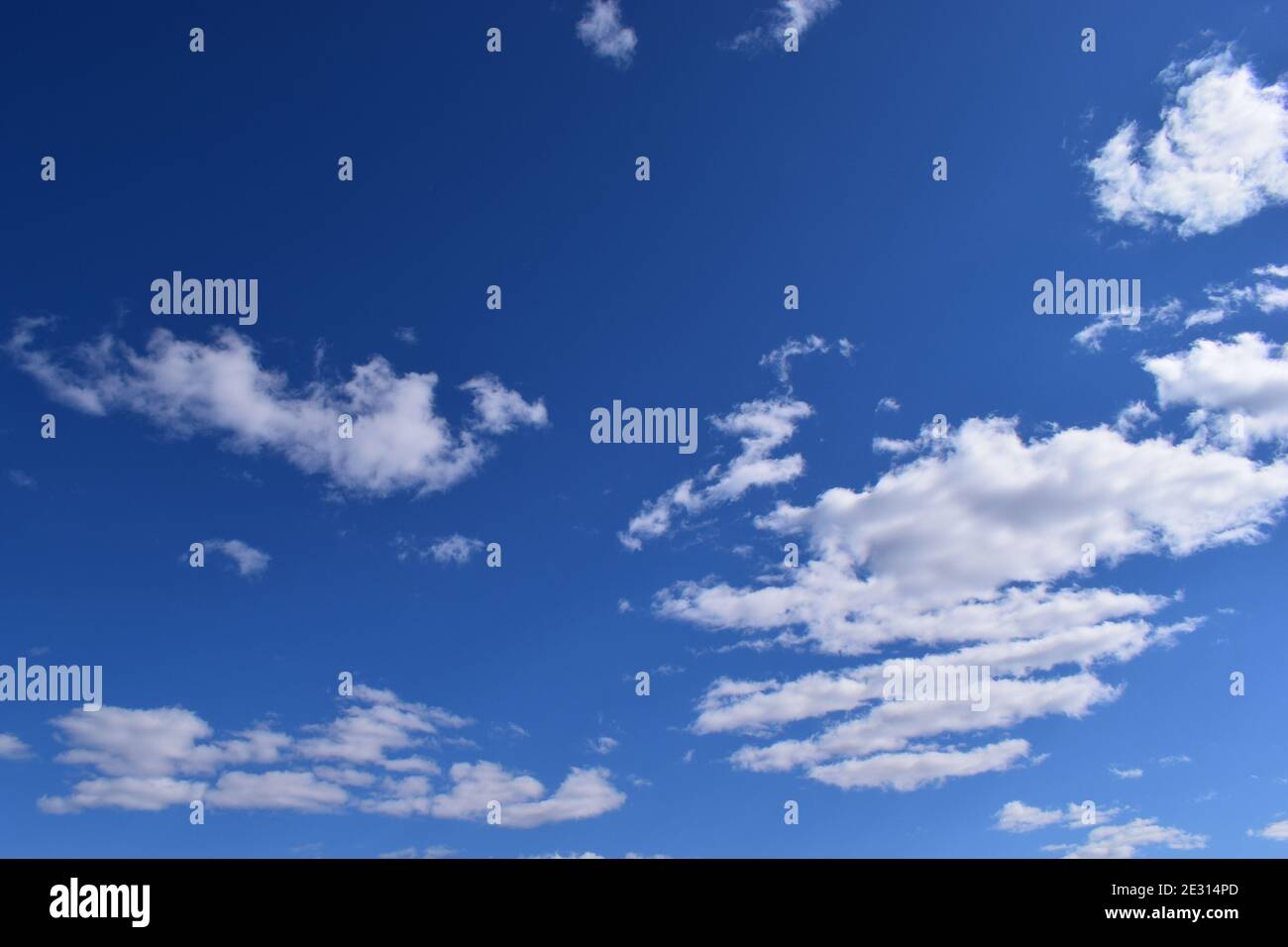 Blue sky and lots small clouds pattern. Deep blue sky and clouds Stock Photo