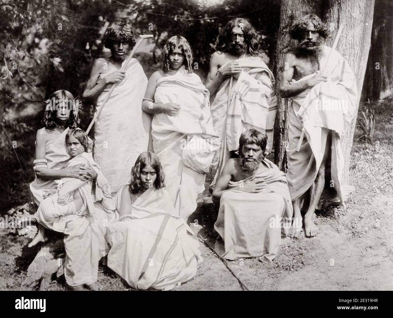 Vintage 19th century photograph: group of Toda people, India. Toda people are a Dravidian ethnic group who live in the Nilgiri Mountains of the Indian state of Tamil Nadu. Stock Photo