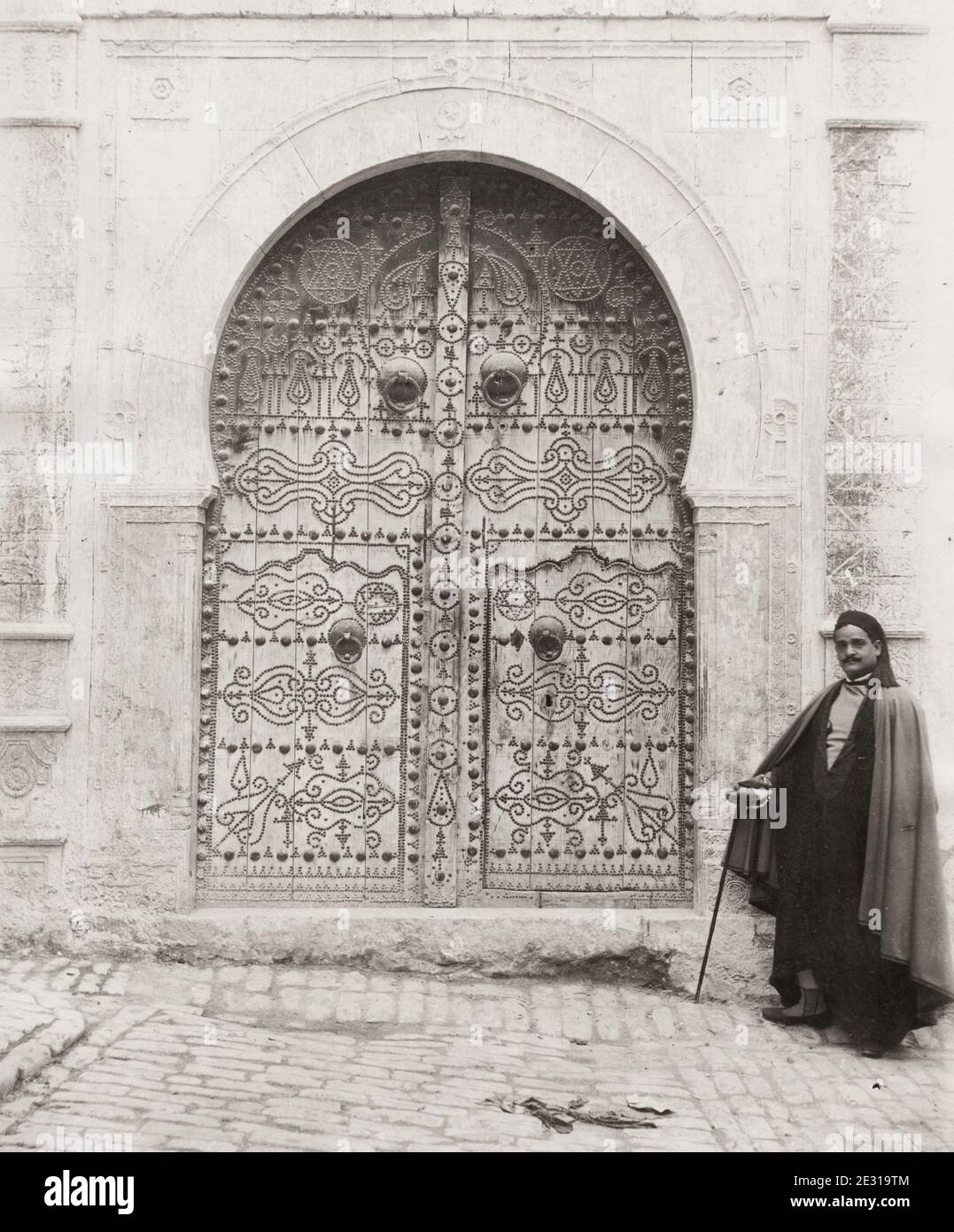 Vintage 19th century photograph: ornate wooden door for a house, architecture, Tunisia. Stock Photo