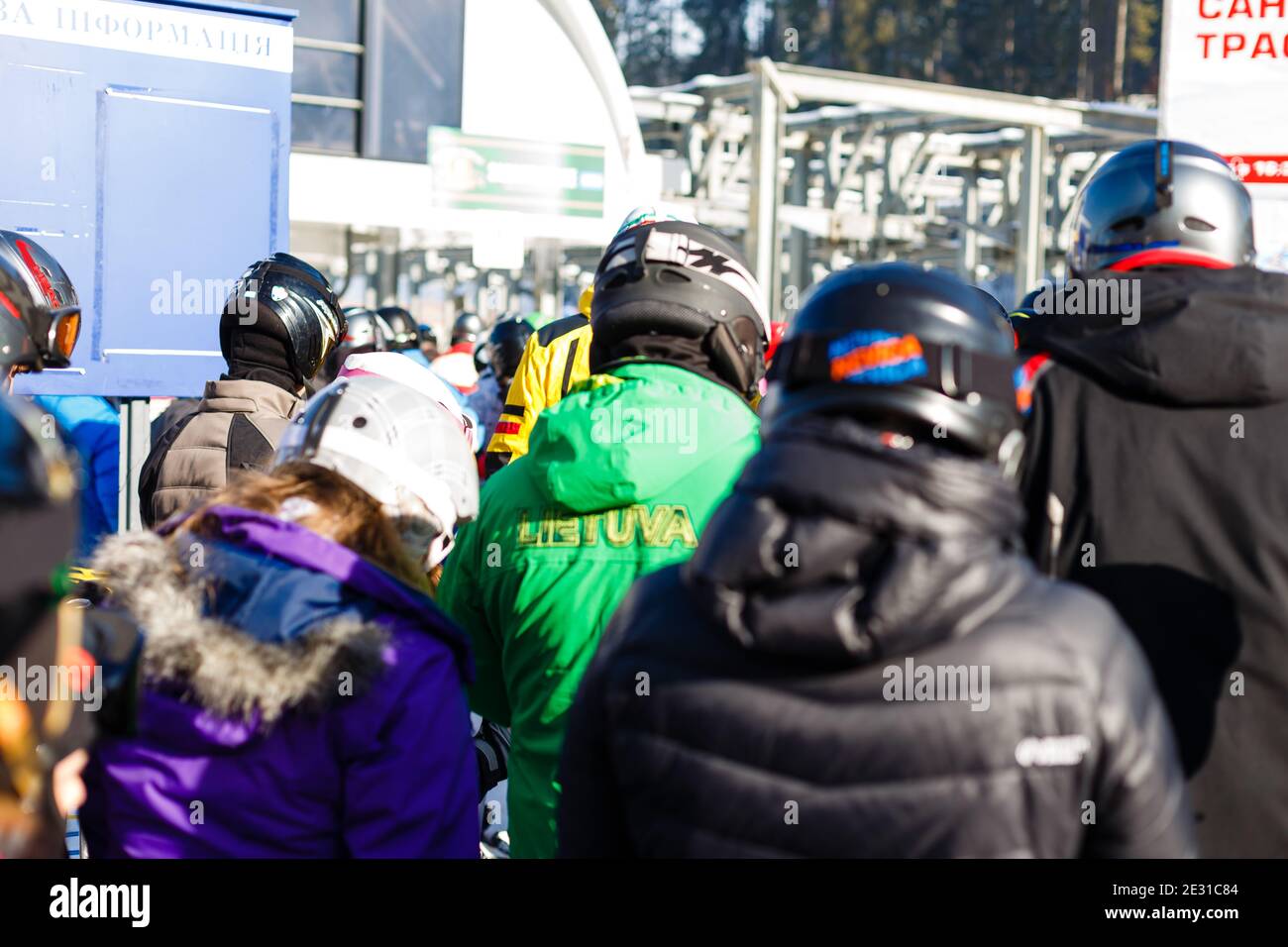 People at ski lift, line of skiers and snowboarders Stock Photo - Alamy
