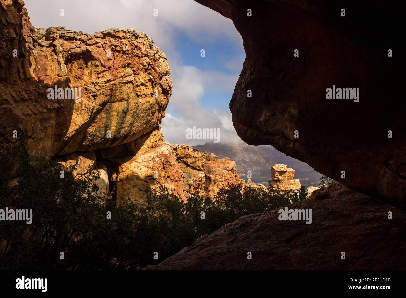 Light and shadows on the weathered sandstone rock formations at the Stadsaal Caves in the Cederberg Mountains of South Africa Stock Photo