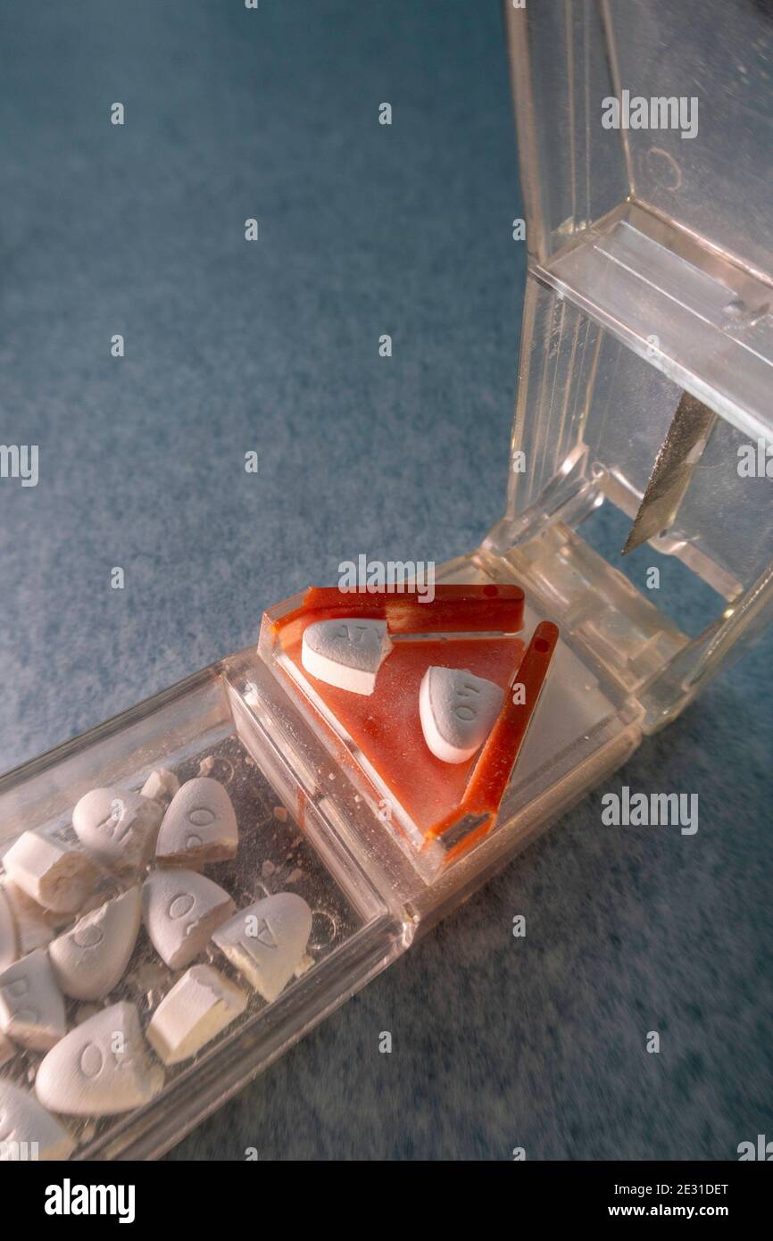 A pill splitter is a convenient way to cut pills, USA Stock Photo Alamy