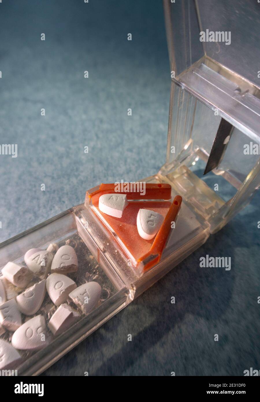 A pill splitter is a convenient way to cut pills, USA Stock Photo Alamy