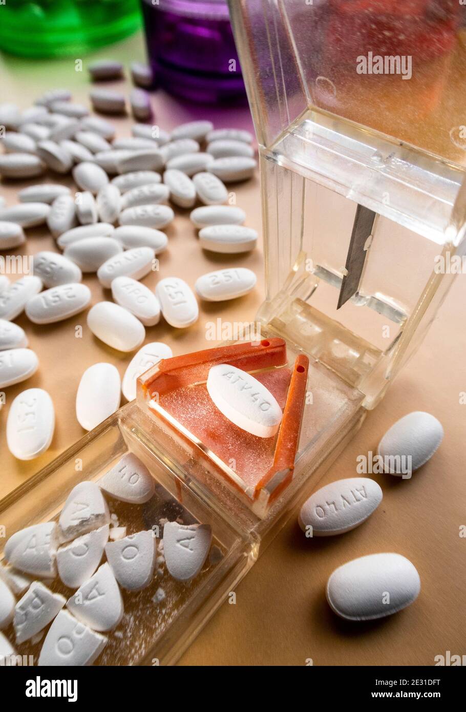 A pill splitter is a convenient way to cut pills, USA Stock Photo Alamy