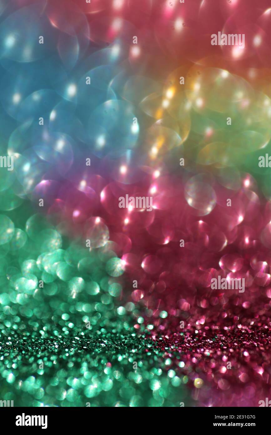 Wallpaper phone shining glitter.Glitter radiance surface. multicolored variegated glitter with shining bokeh.Festive background. Christmas background Stock Photo