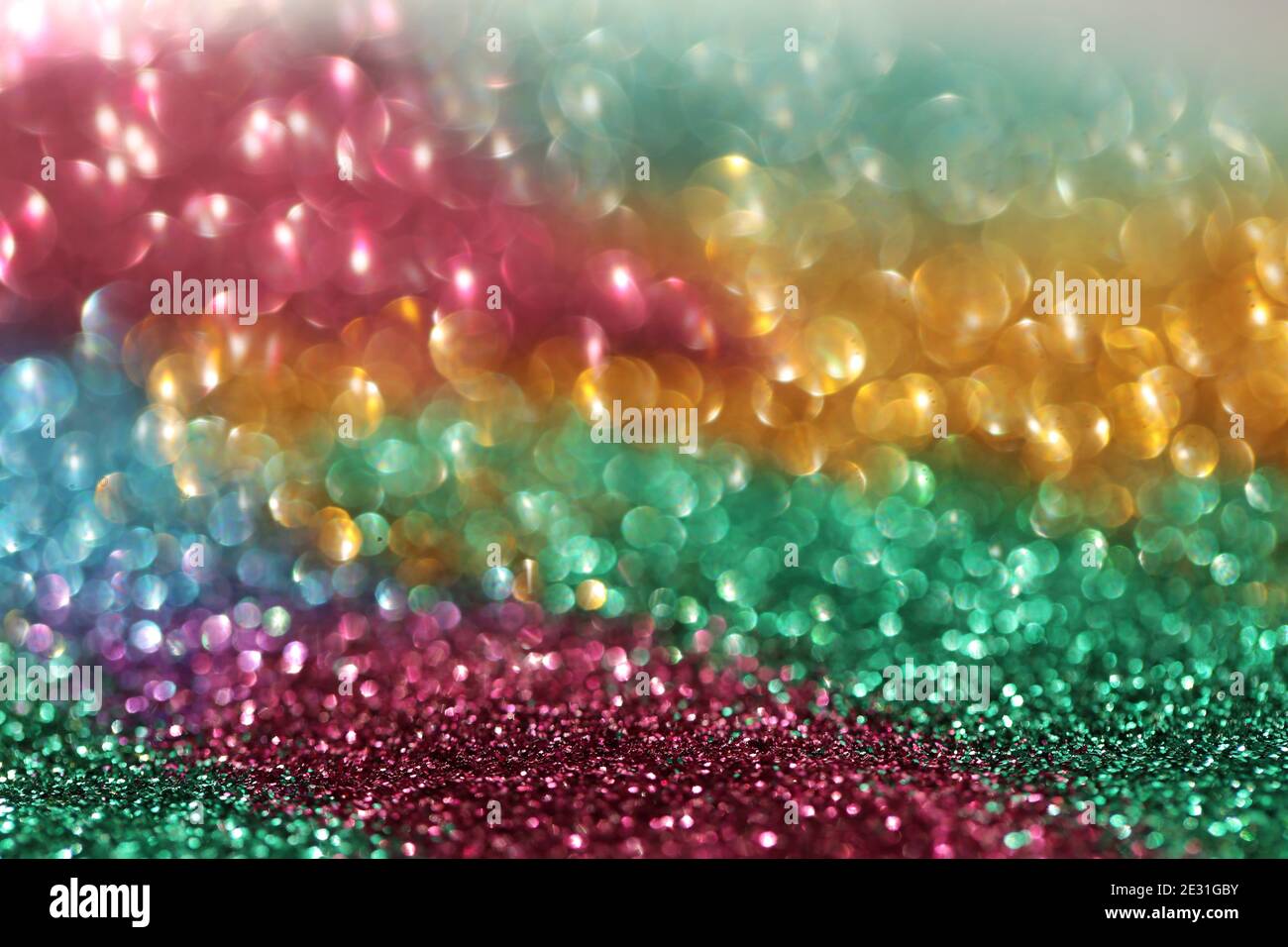 Wallpaper phone shining glitter.Glitter radiance surface. multicolored variegated glitter with shining bokeh.Festive background. New Year and Stock Photo