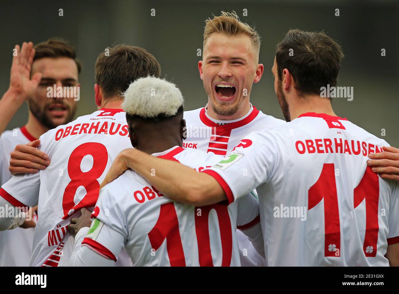 Oberhausen, Deutschland. 16th Jan, 2021. firo: 16.01.2021 football, Regionalliga West, season 2020/2021 SC Rot-Weiss Oberhausen - FC Wegberg-Beeck Tim Stappmann (# 5, SC Rot-Weiss Oberhausen), Bastian Mvºller (# 8, SC Rot-Weiss Oberhausen) and Sven Kreyer (# 11, SC Rot-Weiss Oberhausen) congratulates the goalschvºtzen Shaibou Oubayepwa (# 10, SC Rot-Weiss Oberhausen). goaljubel, jubilation, joy, | usage worldwide Credit: dpa/Alamy Live News Stock Photo