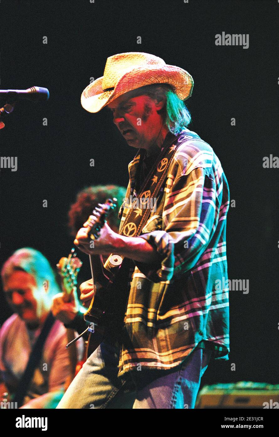 Neil Young and Crazy Horse in concert at the Birmingham NEC Arena, Birmingham, UK. 15th June 2001 Stock Photo