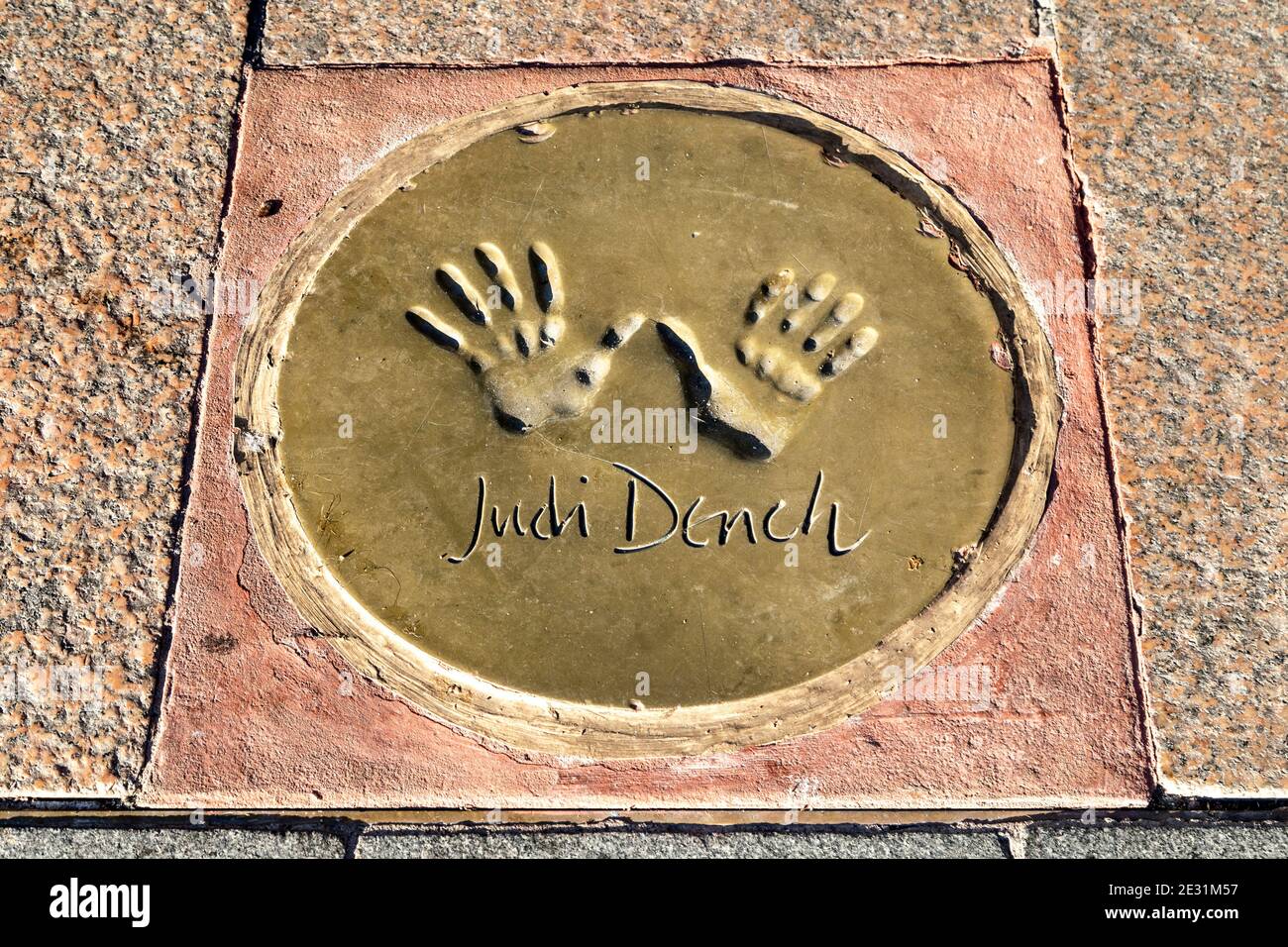 Judi Dench's hand prints in front of the Vue West End Cinema in Leicester Square, London, UK Stock Photo