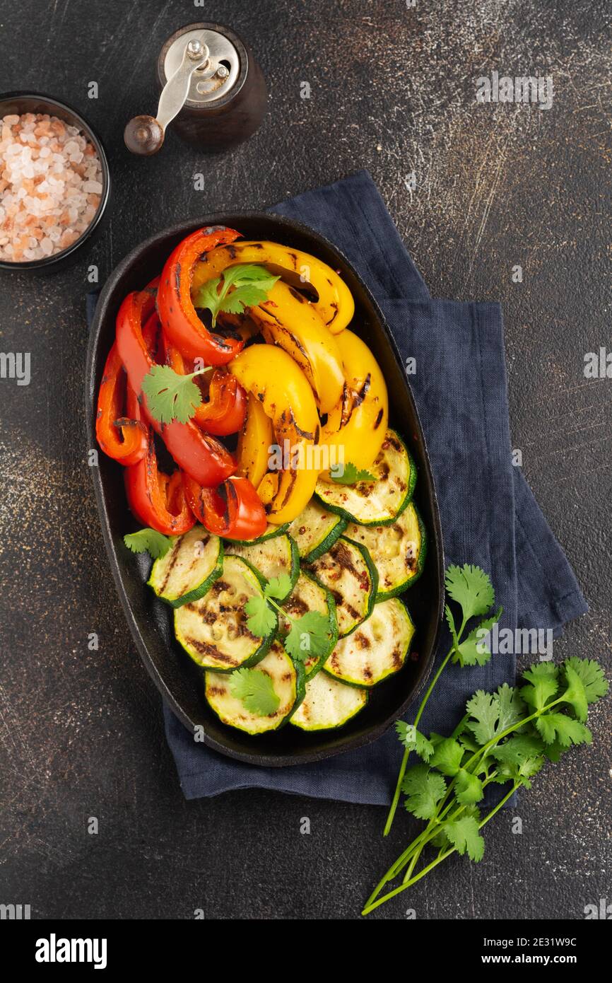 Grilled vegetables pieces of zucchini, red and yellow pepper and