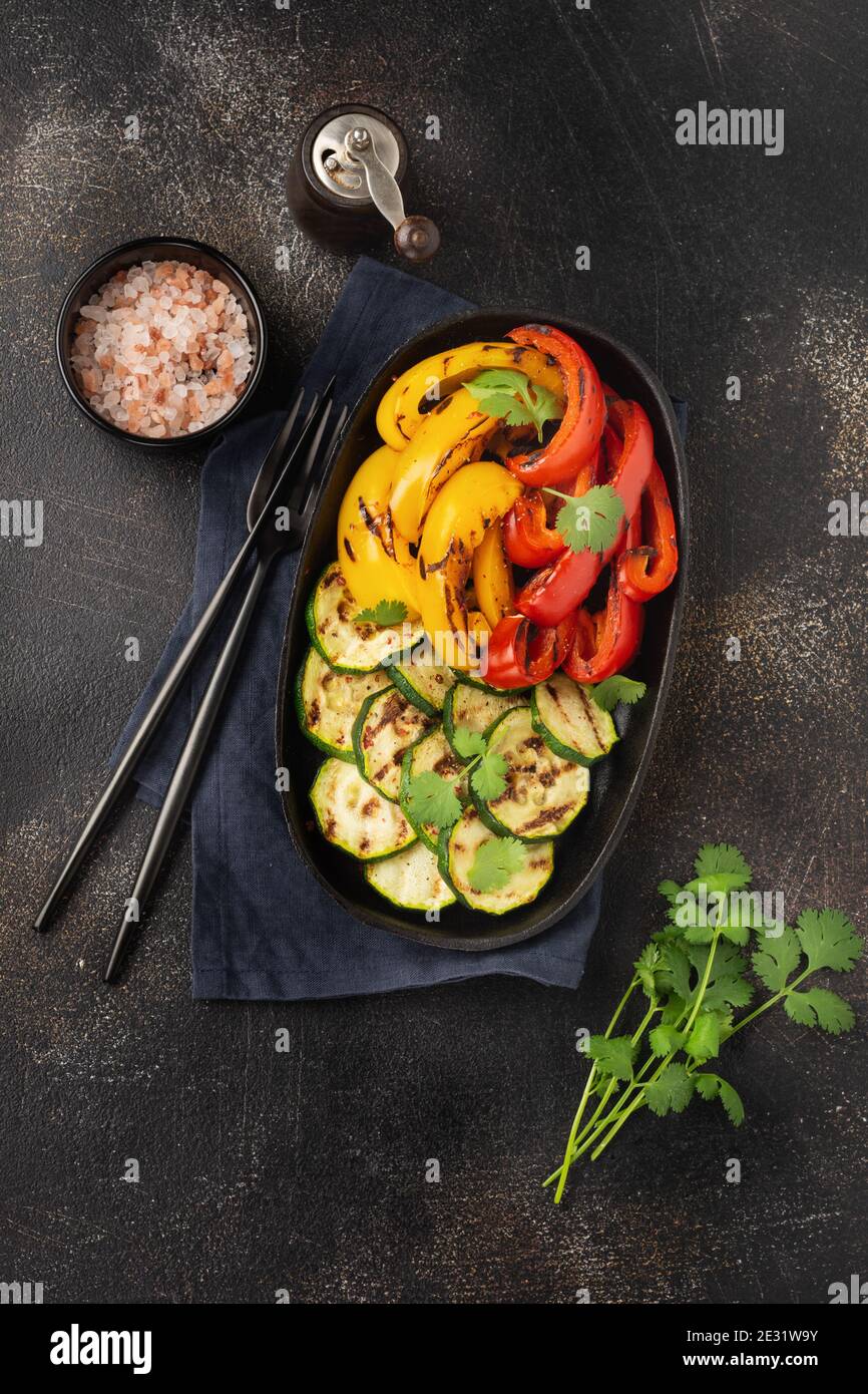 Grilled vegetables pieces of zucchini, red and yellow pepper and