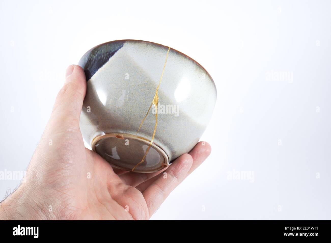 Grey and blue Japanese Kintsugi bowl Stock Photo Alamy