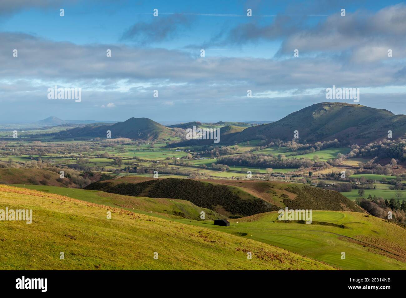 View from the Long Mynd, Shropshire, England, towards Caer Caradoc, The Lawley, with The Wrekin in the distance. Stock Photo