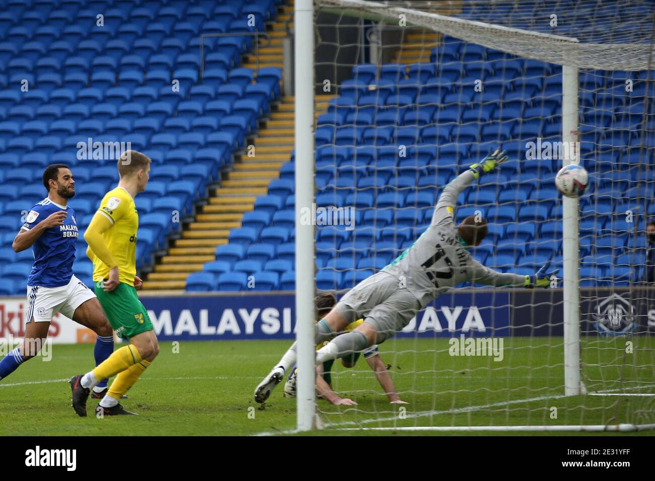 Cardiff, UK. 16th Jan, 2021. Grant Hanley of Norwich city (Partially hidden) scores his teams 1st goal.EFL Skybet championship match, Cardiff city v Norwich City at the Cardiff City Stadium in Cardiff, Wales on Saturday 16th January 2021. this image may only be used for Editorial purposes. Editorial use only, license required for commercial use. No use in betting, games or a single club/league/player publications. pic by Andrew Orchard/Andrew Orchard sports photography/Alamy Live news Credit: Andrew Orchard sports photography/Alamy Live News Stock Photo
