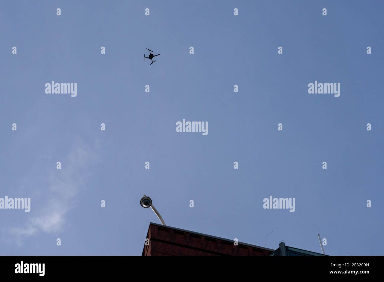 A drone flies tethered to a building ahead of the upcoming inauguration for President Joe Biden January 16, 2021 in Washington DC. Security is even tighter given there recent events on Jan 6, when pro-Trump MAGA mobs breached the security perimeter and penetrated the U.S. Capitol Photo by Ken Cedeno/Pool/ABACAPRESS.COM Stock Photo