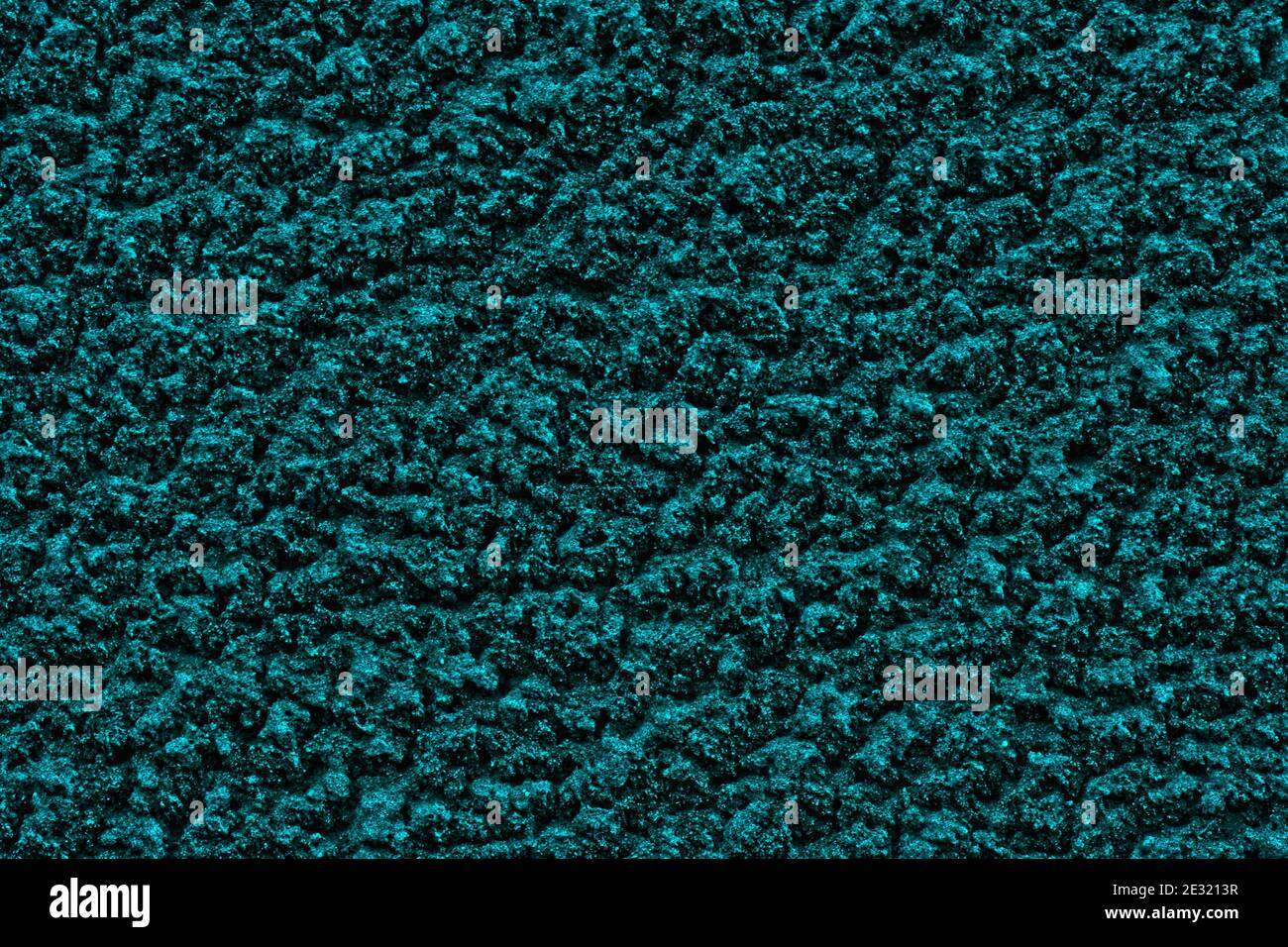 Dark cyanide solid background with rough plaster texture.  Stock Photo