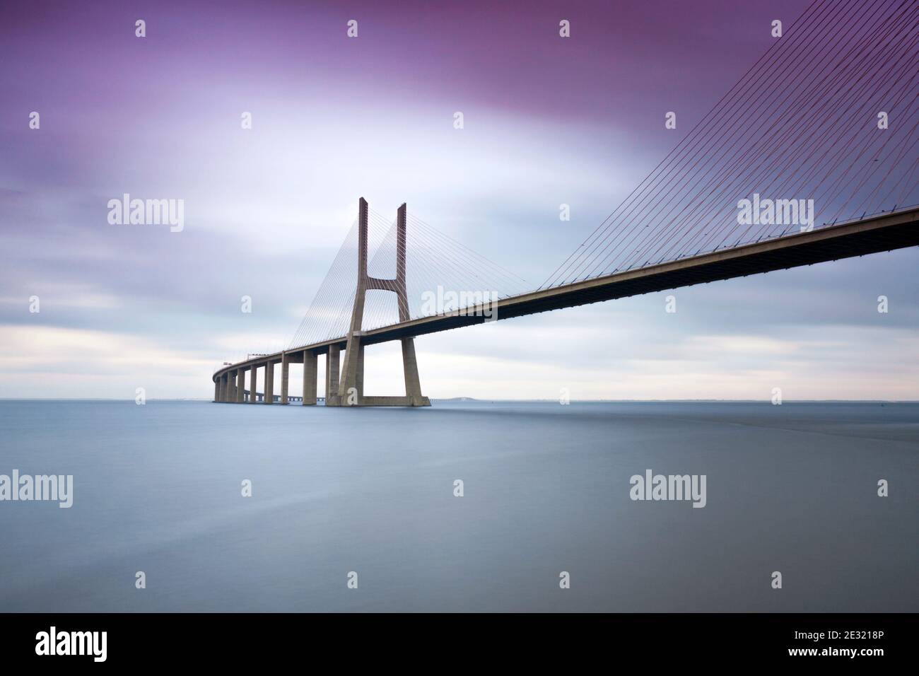 View of the famous Vasco da Gama bridge over the Tagus river in Lisbon, Portugal. Space for text. Stock Photo