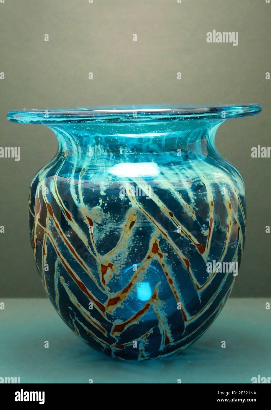 flat top curved body, blue with yellow threads  in the Chevron pattern Mdina vase in the style of Micheal Harris , signed and labelled Stock Photo
