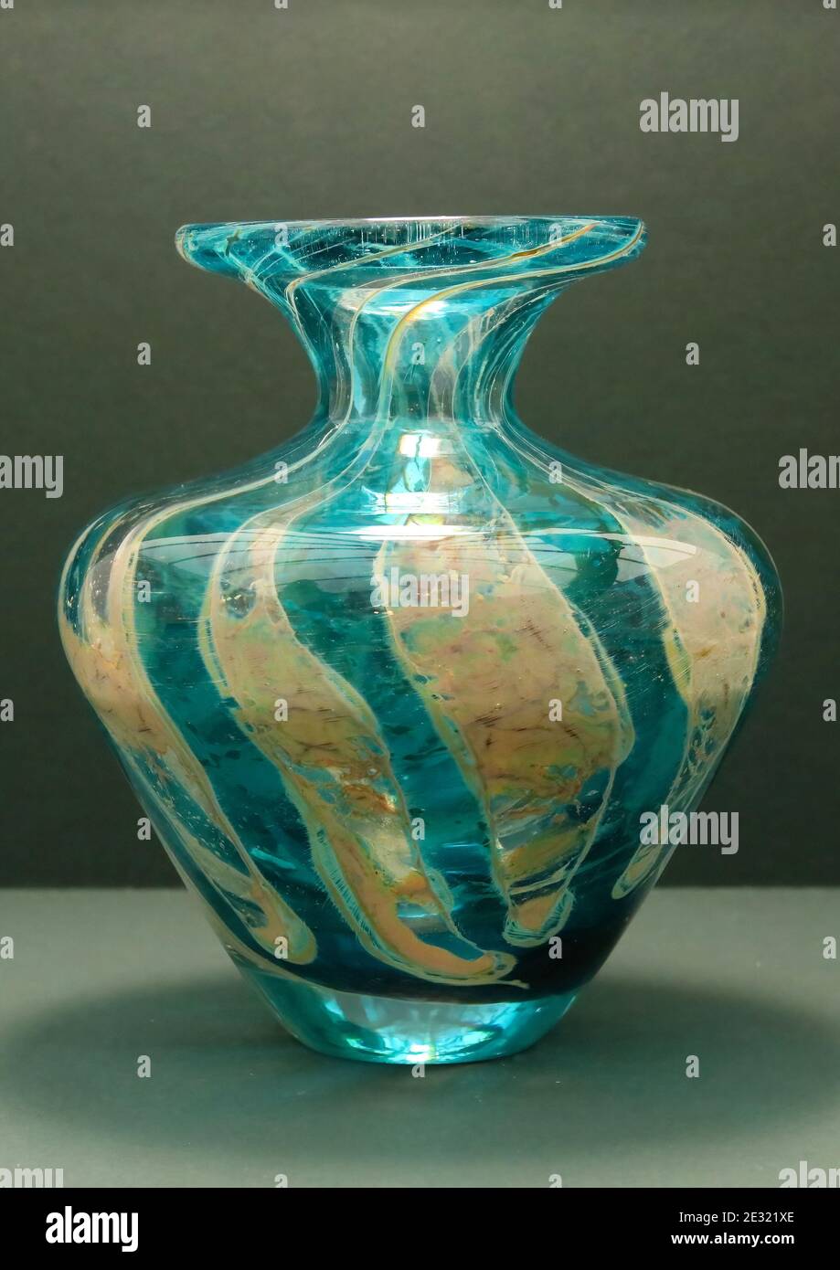 aquamarine with yellow threads vase  in the sad and sea  pattern Mdina vase in the style of Micheal Harris , signed and labelled Stock Photo