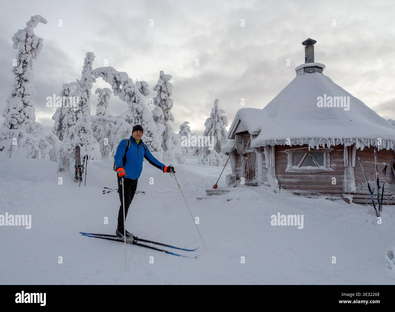 Skier in snowy landscape in Finland's Lapland Stock Photo